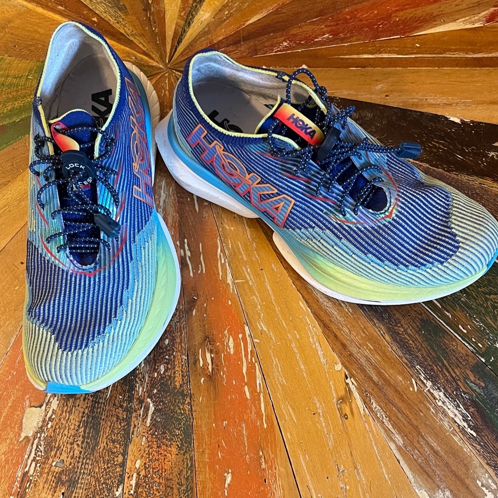 Hoka women’s Vibrant Blue and Lime Cielo C1 race/running shoes.